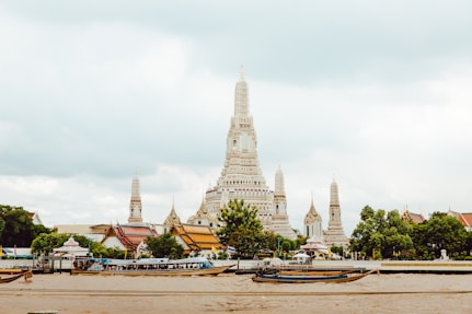 white and gray concrete building under gray sky