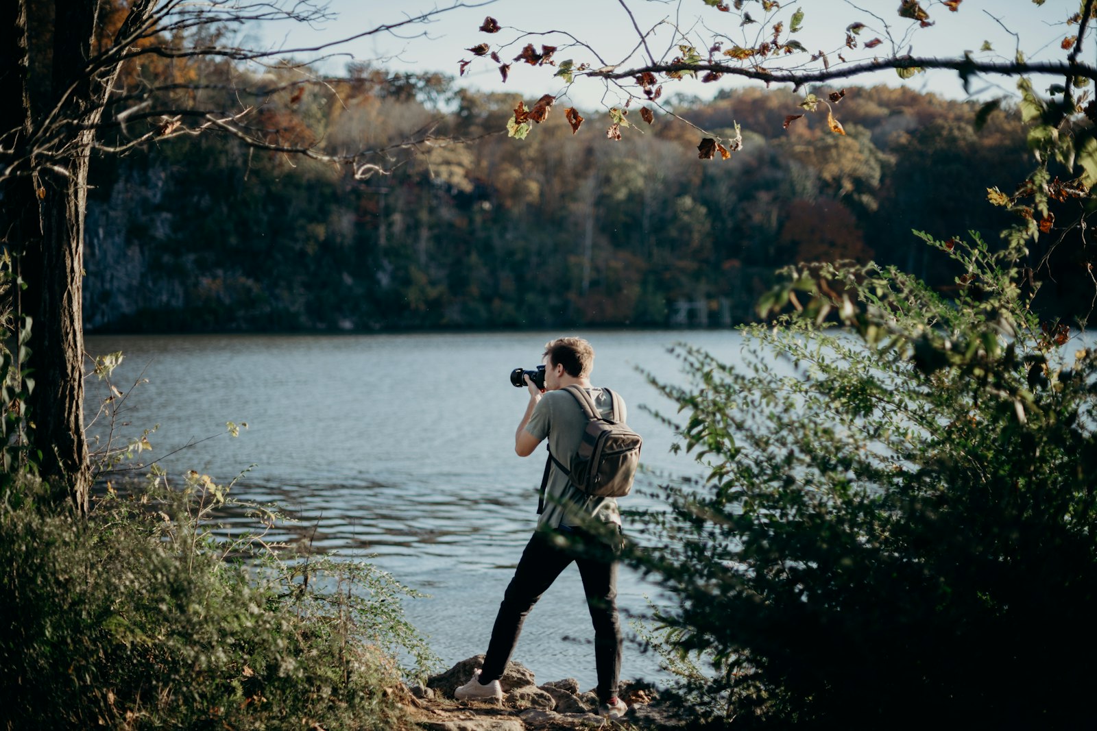 Nikon D850 + Nikon AF-S Nikkor 50mm F1.4G sample photo. Man with backpack taking photography