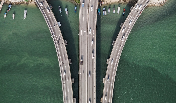 three gray concrete highways