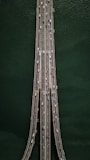 aerial view of bridge with cars crossing