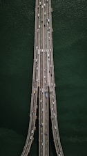 aerial view of bridge with cars crossing
