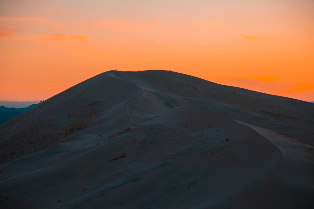 landscape photography of sand dune