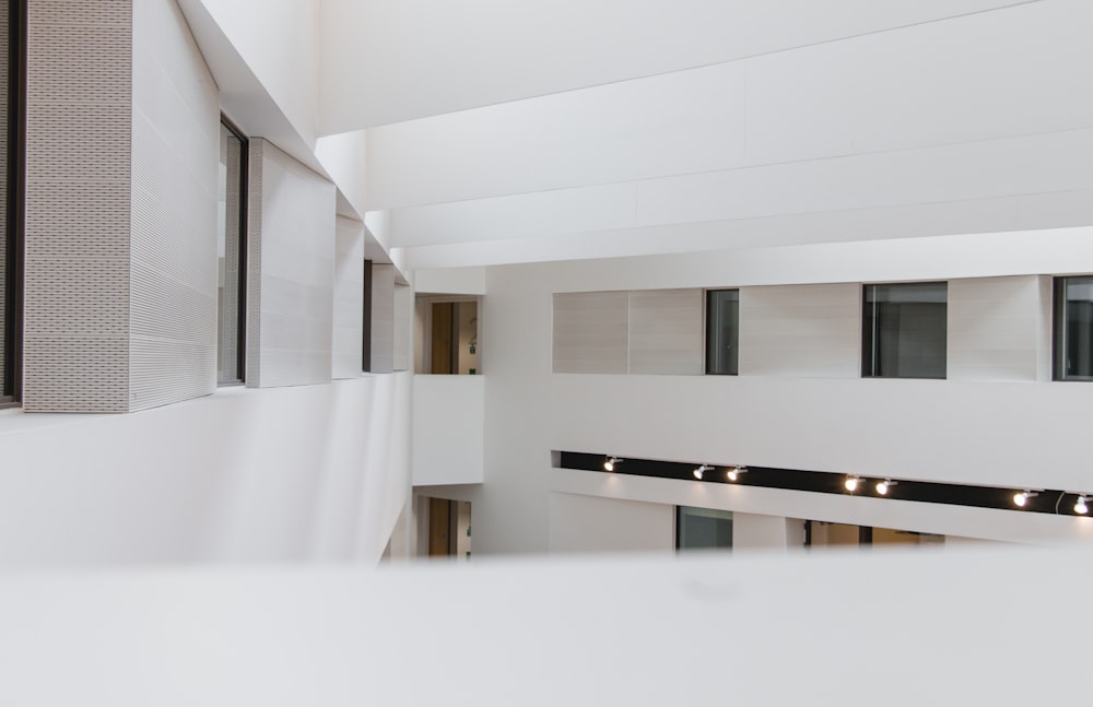 Photography Of White Concrete Building During Daytime Photo