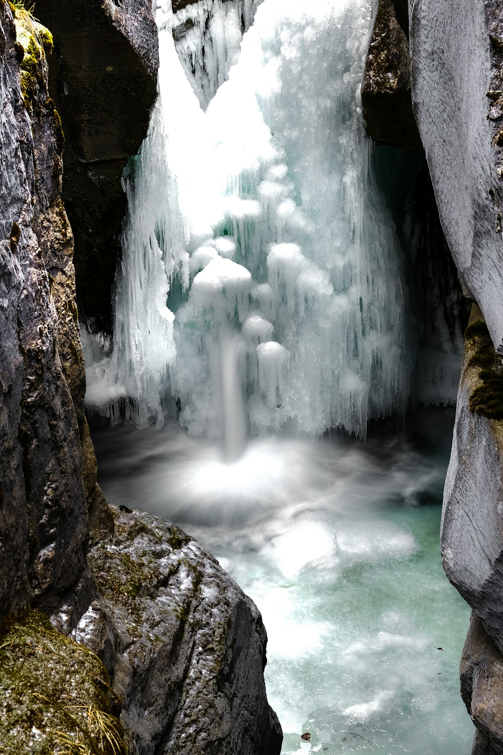 waterfall and gray cave