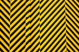 yellow and black striped textile