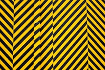 yellow and black striped textile