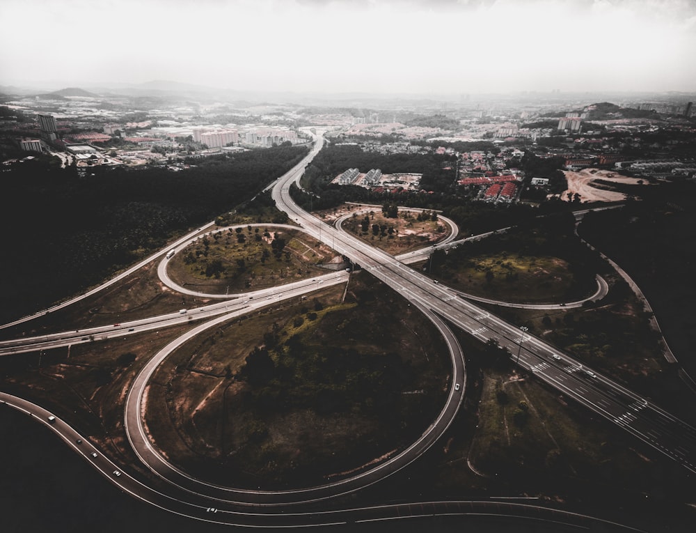 aerial photo of gray concrete road