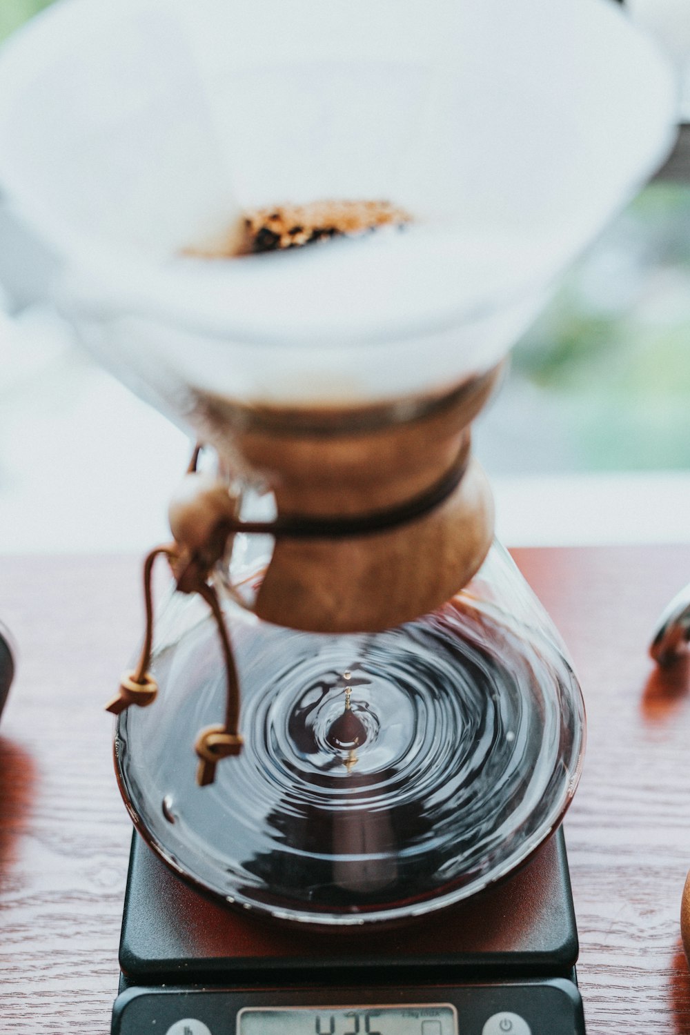 selective focus photography of coffee funnel