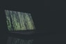 black and gray laptop computer turned on