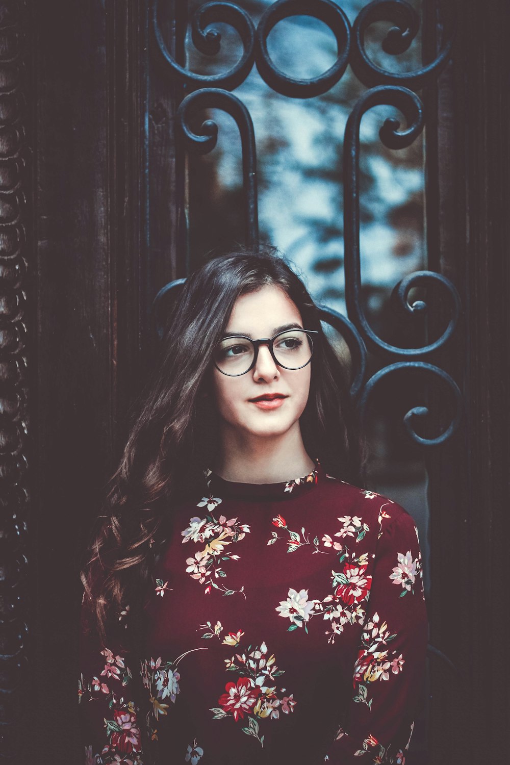 woman with eyeglasses and red dress