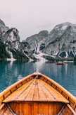 people in brown wooden boat