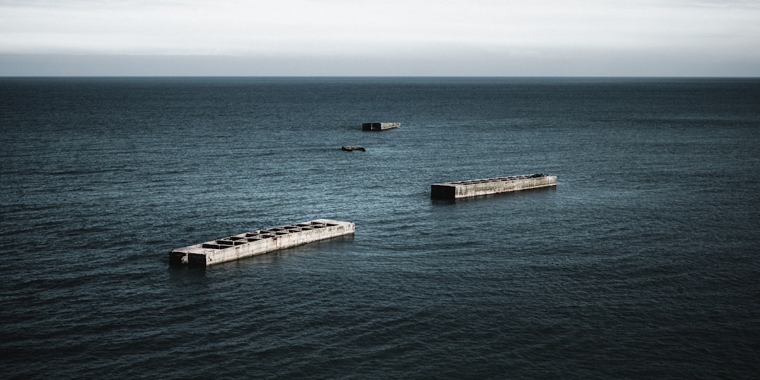 aerial photo of trailers on body of water