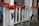 Close-up of a decorated front porch with seasonal wreath and lanterns.