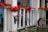 Close-up of a decorated front porch with seasonal wreath and lanterns.