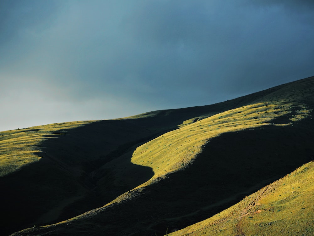 mountain under black sky