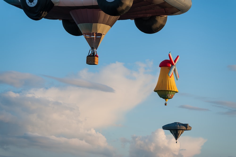 three hot air balloons on air