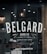 A barber shop window features the name 'BELGARD' prominently in large, bold letters. Below it, the words 'Barbier' and 'Barbershop & Spa' are displayed with decorative elements like straight razors. The reflection shows a dimly lit interior with a classic barber pole, a hanging vintage light bulb, and grooming products on a wooden shelf. The website www.belgardmtl.ca is also visible.