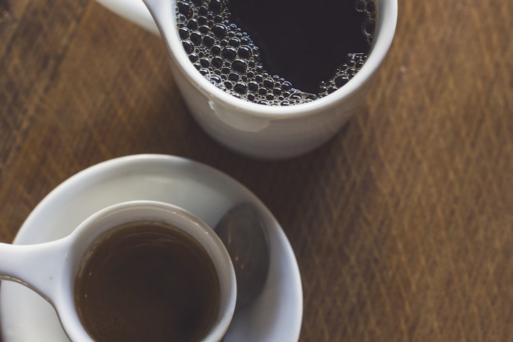 coffee on white ceramic cups