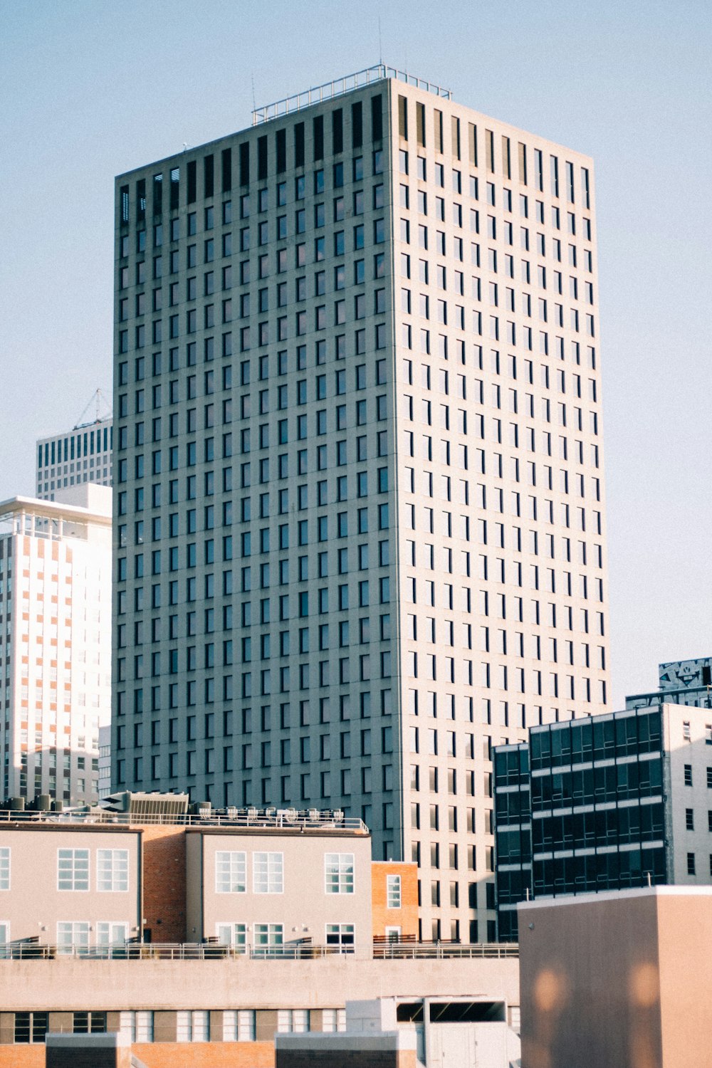 white concrete building in shallow focus lens