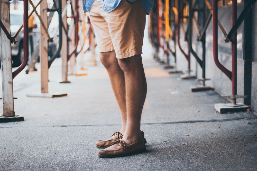 person standing on road