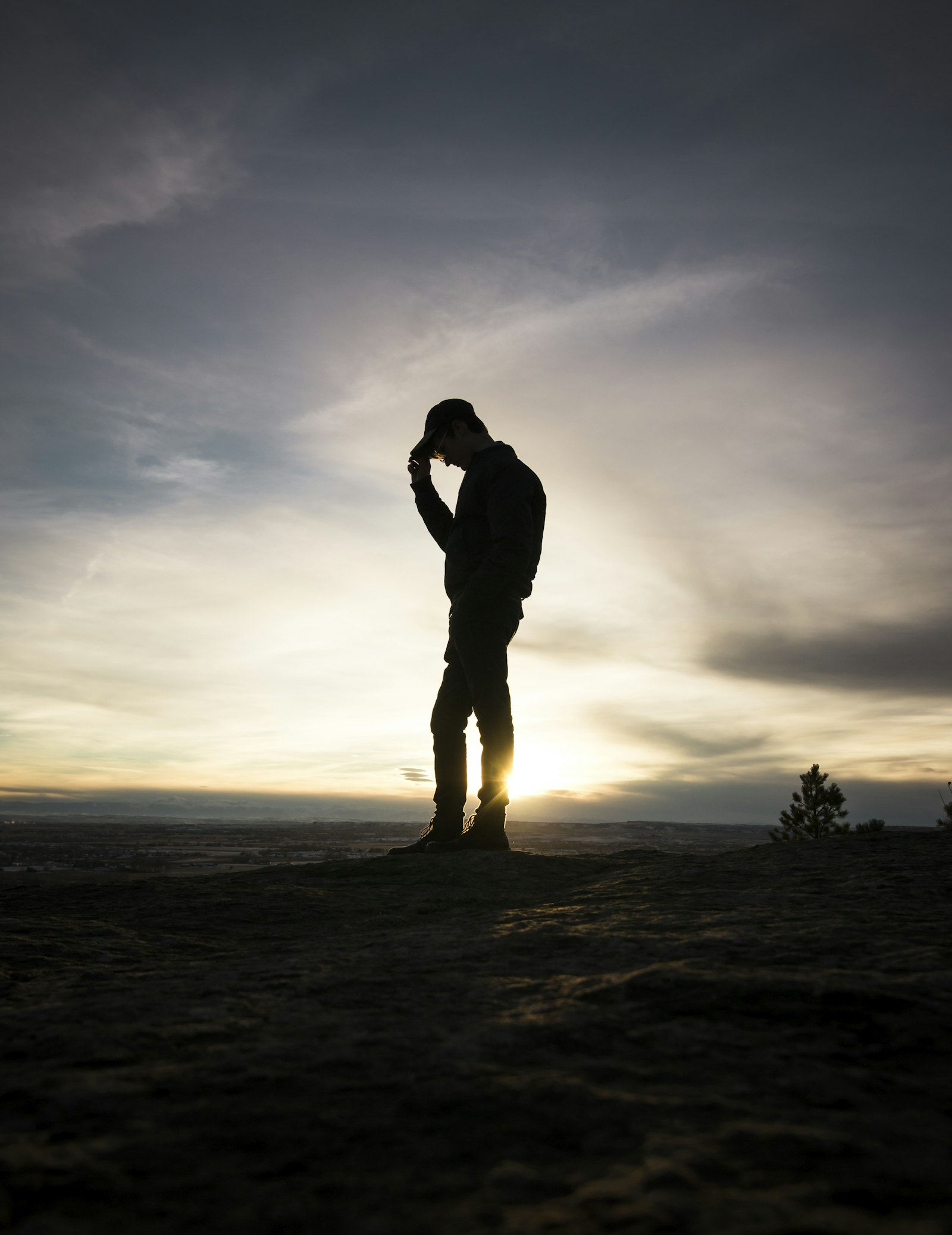 Tokina AT-X Pro 11-16mm F2.8 DX sample photo. Silhouette man standing holding photography