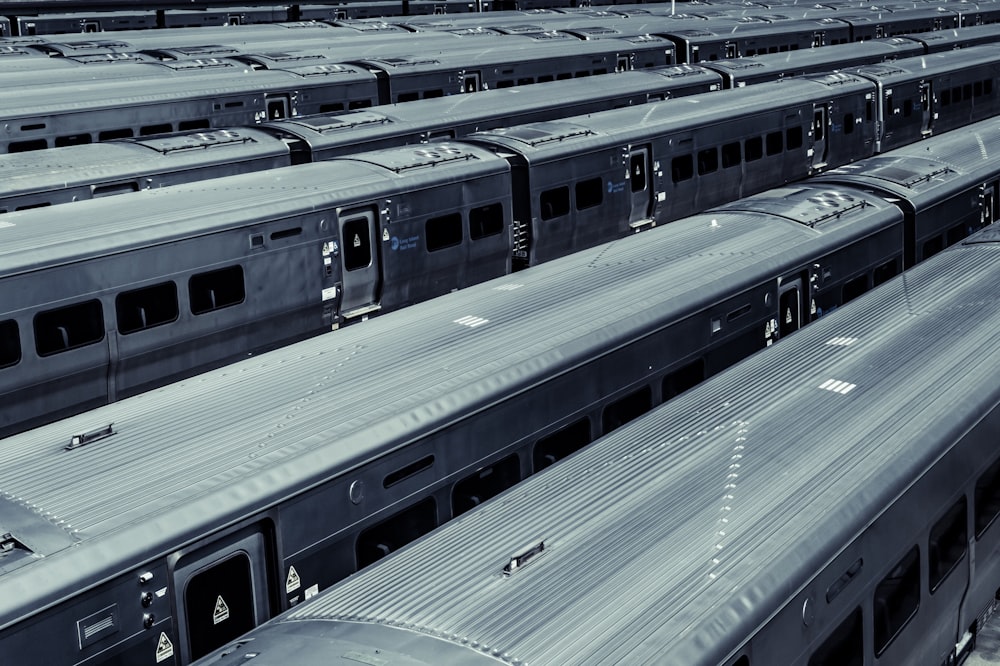 high-angle photography of gray trains
