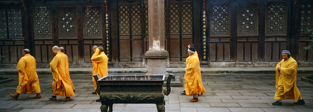 monk walking near temple