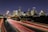 time lapse photography of vehicle traveling with a speed of light in road