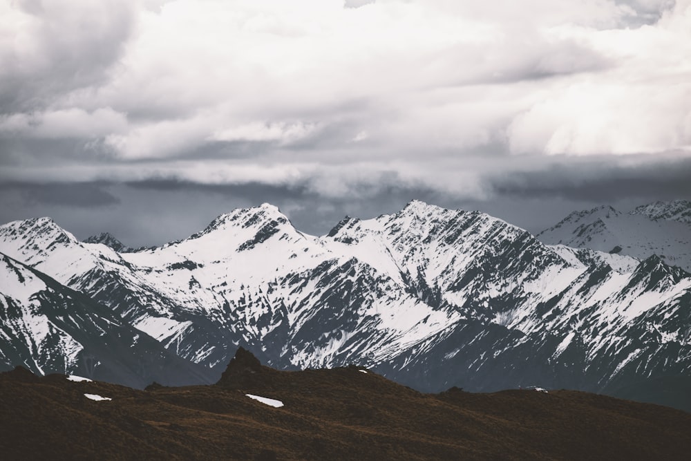 selective focus photography of mountain covered by snow