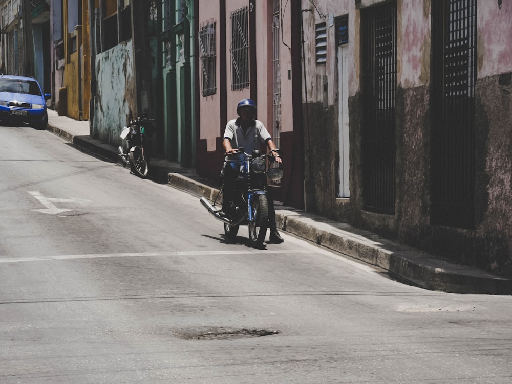 man riding motorcycle