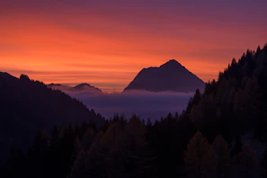 Sunset view over misty mountains and green valleys in Costa Rica