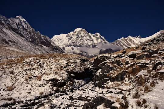 mountains under blue sky in Annapurna Nepal
