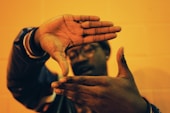 man doing hand gesture