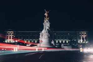 time lapse photography of gray building and statue