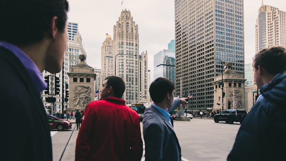 men standing near road