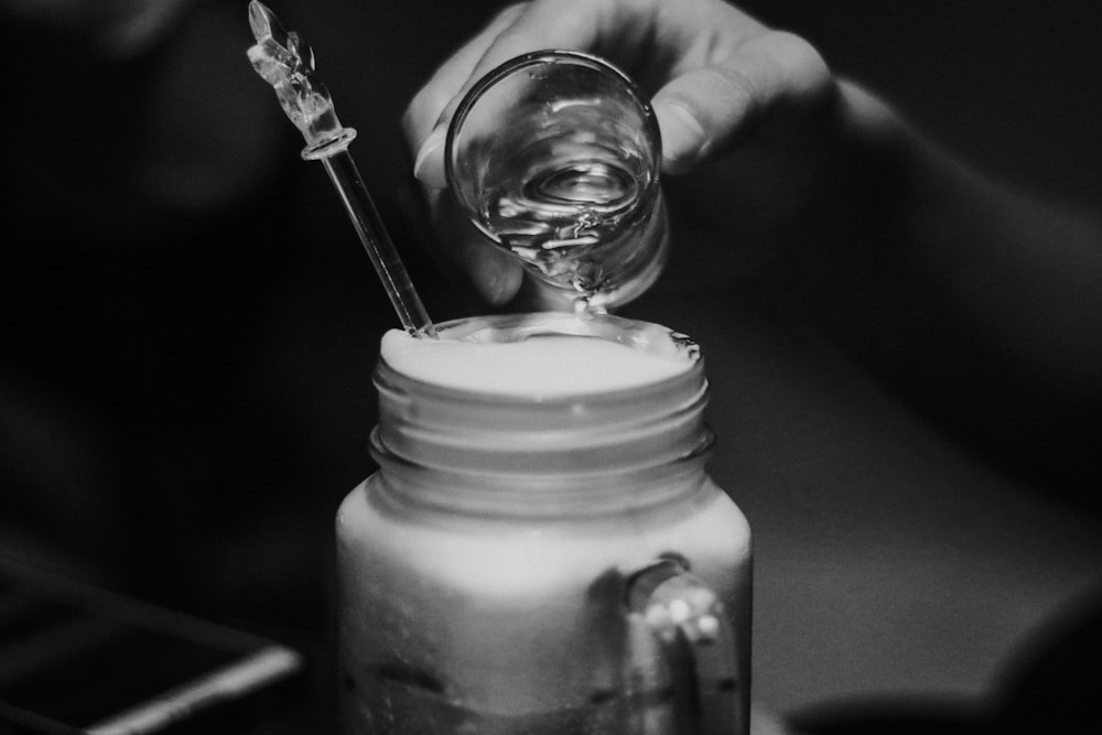 grayscale photography of jar