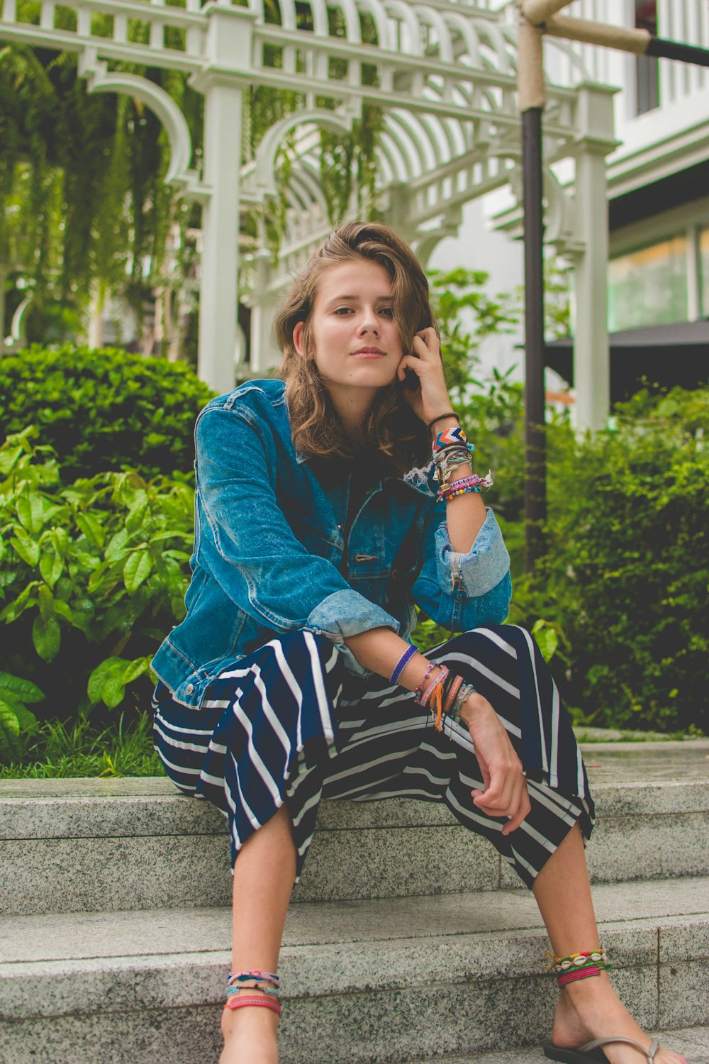 woman sitting on stair