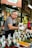 man selling assorted seeds