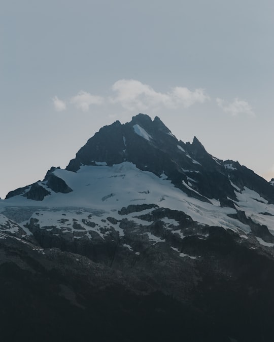 snow covered mountain under white clouds in Blackcomb Canada