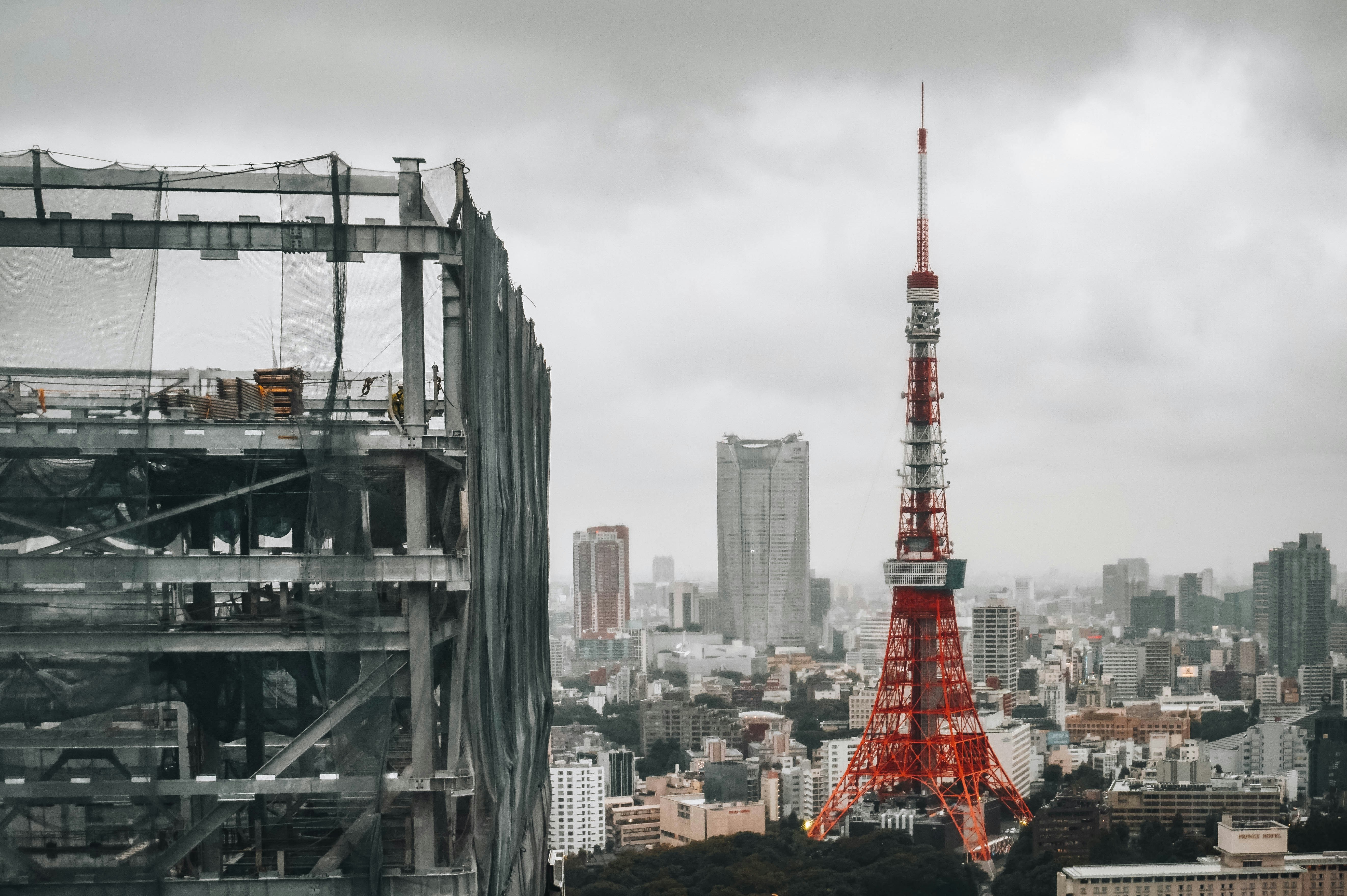We went to World Trade Center and saw this colossal structure blocking our view; thankfully the end of the corner left some tight space for the beauty of Tokyo Tower to peak through.