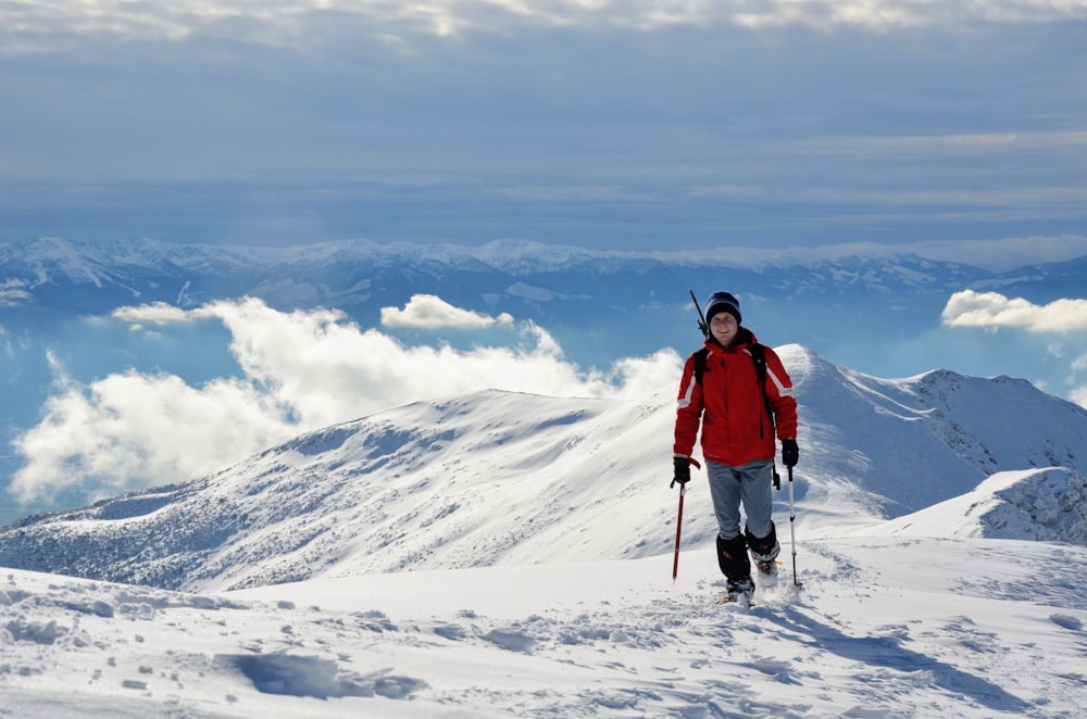 person on snow mountain during daytime