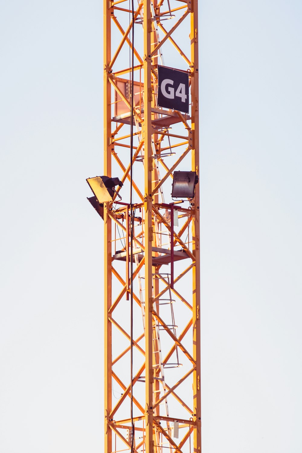 spot light on yellow steel tower