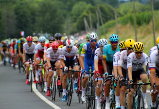 group of men riding bicycle