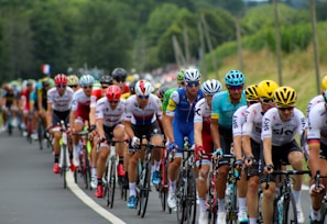 group of men riding bicycle