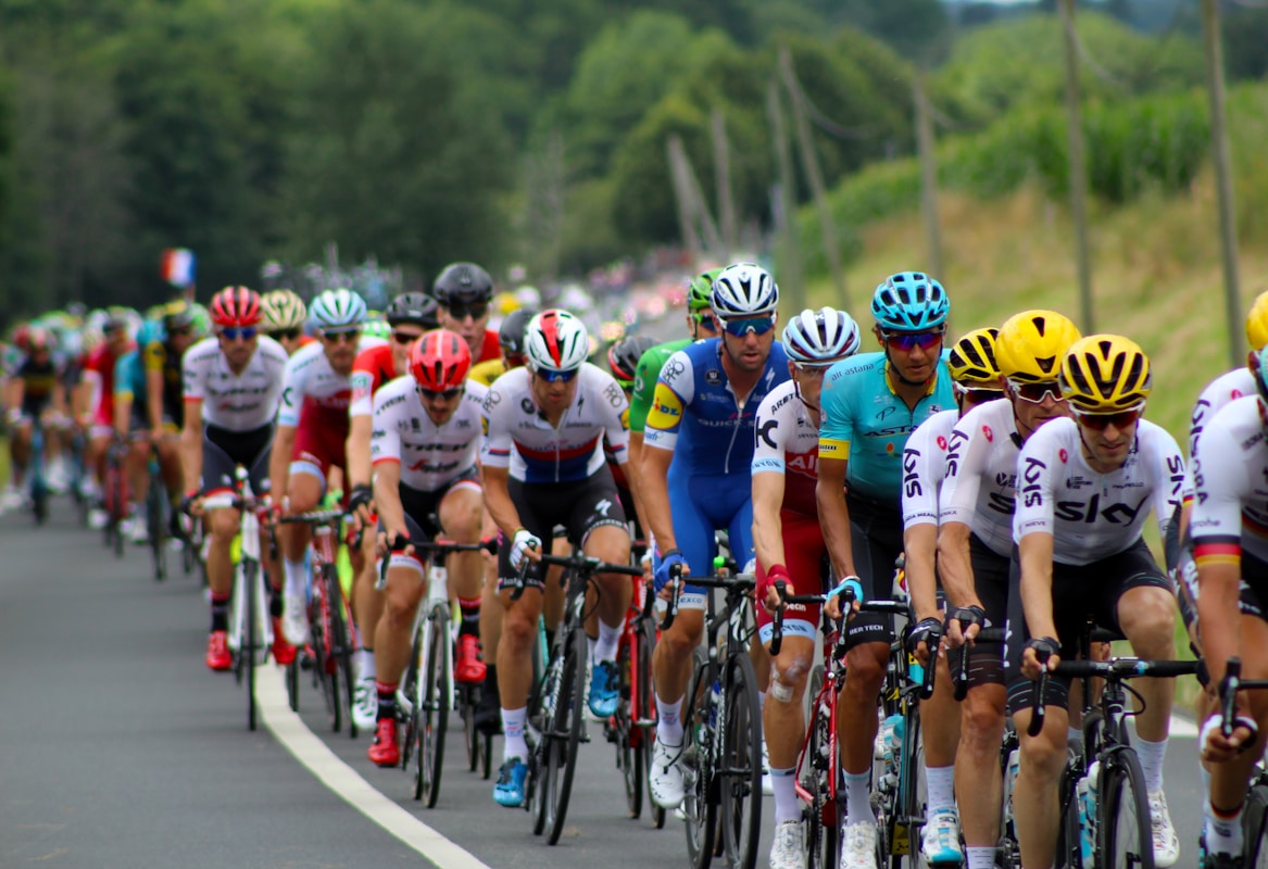 Professional cycling peloton racing on an open road
