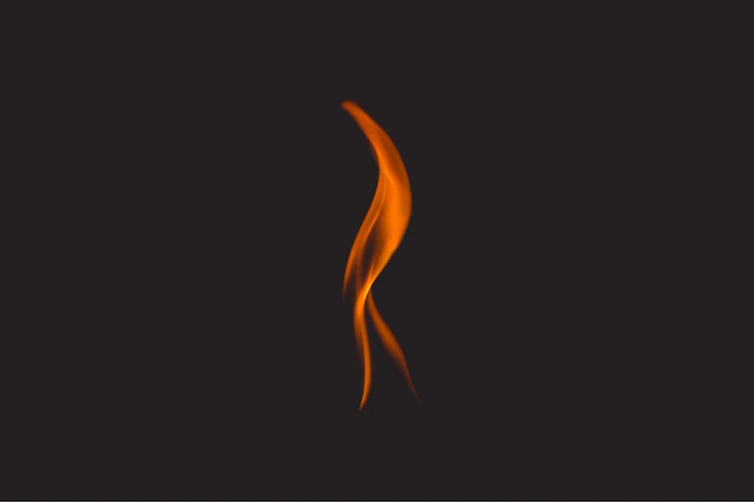 A single flame against a dark background, representing vertical-burn fire testing