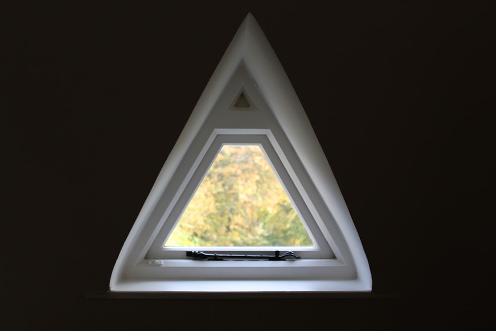 triangular white wooden frame