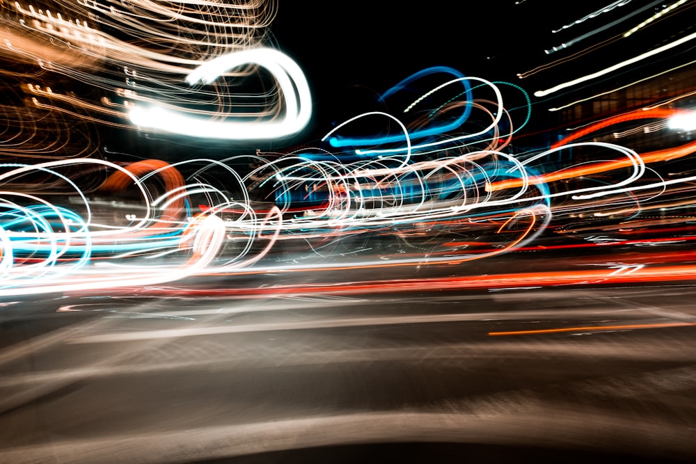 a blurry photo of a city street at night