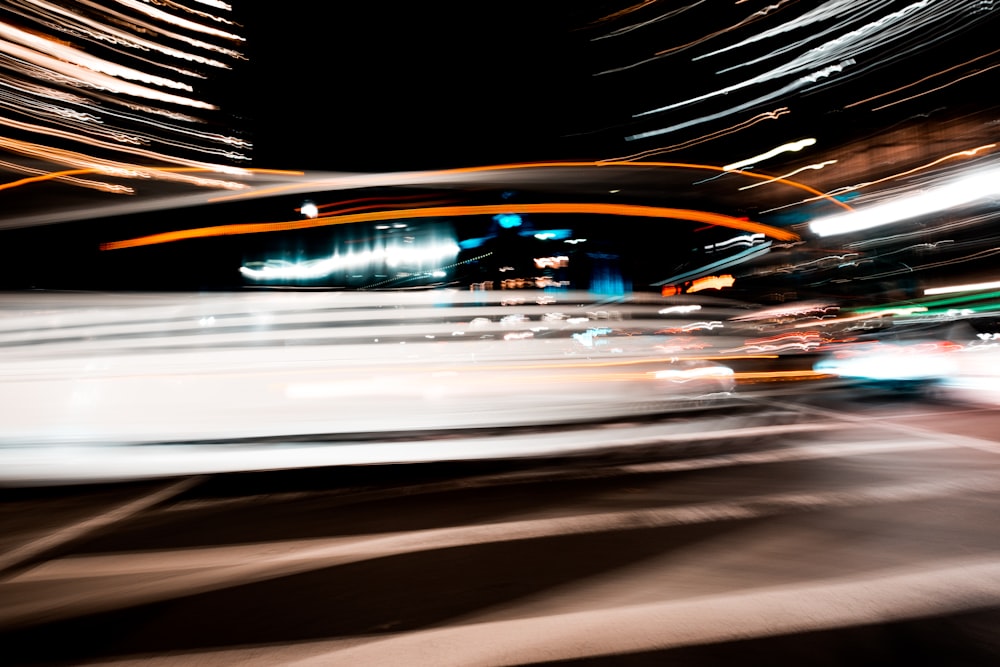 a blurry photo of a city street at night