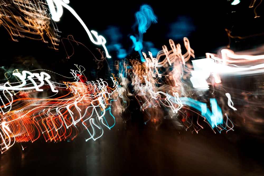 a blurry photo of a city street at night